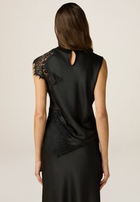 Oltre IN RASO - Top - nero