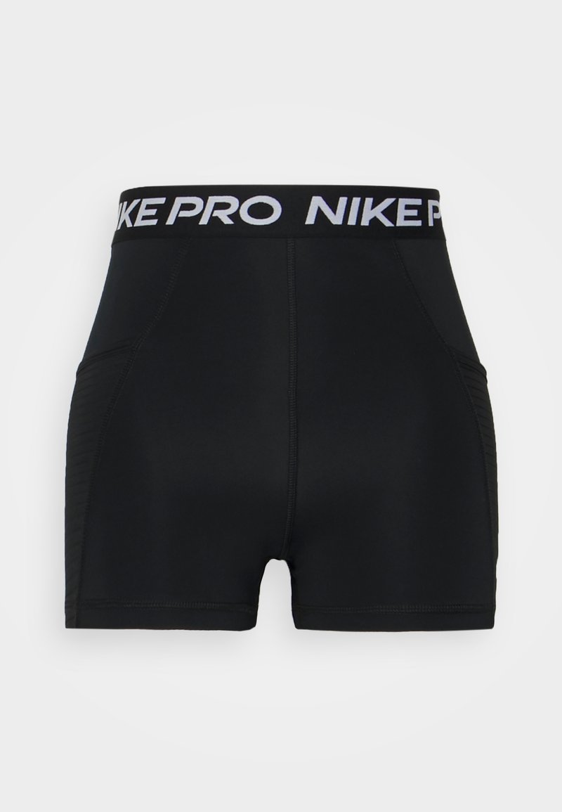 Mustat urheilushortsit leveällä vyötärönauhalla, jossa on valkoisella "NIKE PRO". Tekstuurilliset sivupaneelit ja sileä kangas kauttaaltaan.