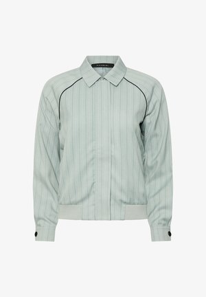 Lichtgrijze jack met rits, met dunne verticale strepen, zwarte bies op de schouders, knoopmanchetten en een geribde zoom.