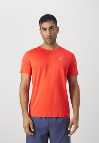 ASICS CORE TOP - Sports T-shirts - true red