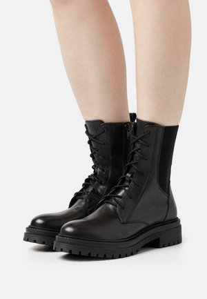 Geox IRIDEA - Stivaletti con plateau - black