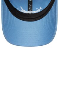 Light blue baseball cap with black inner trim and white embroidered text on the front panel visible inside the brim.