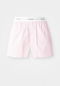 Světle růžové bavlněné boxerky s elastickým bíl�ým pasem, na kterém je logo Calvin Klein, s jedním knoflíkovým zapínáním a bočními kapsami.
