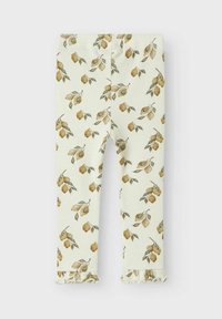 Ribbed leggings i ljusgul med ett blommönster av gröna blad och gula blommor, med volangdetaljer vid fållen.