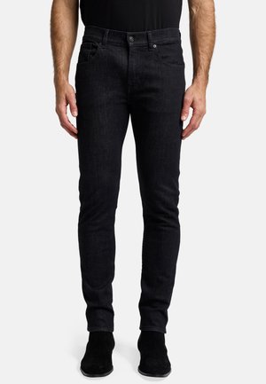 - Jeansy Slim Fit