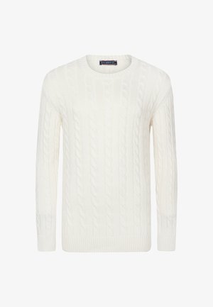 Hvid kabelstrik trøje med rund hals, lange ærmer og ribbedemanchetter og kant. Teksturen har et hævet kabelmønster over det hele.