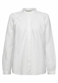 Camicia bianca in lino con maniche lunghe, colletto alto, chiusura frontale con bottoni e dettaglio arricciato sotto il colletto. Tessuto liscio.