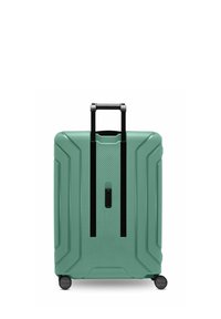 Maleta rígida en verde menta con superficie texturizada, mango telescópico negro y cuatro ruedas para mayor movilidad.