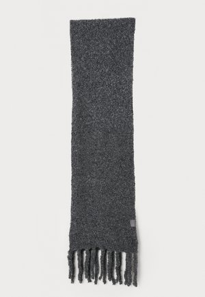 Grey knitted scarf with a soft texture, featuring fringed ends and a small logo tag on one side. Elongated and rectangular design.