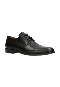 Scarpa da uomo in pelle nera con finitura liscia, punta tonda, design stringato e dettagli di cucitura sottili lungo i lati e sulla punta.