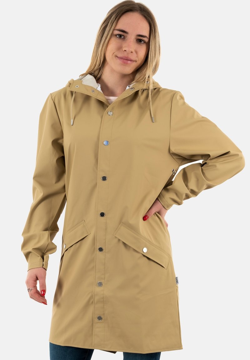 Beige waterproof raincoat with a hood, snap buttons, side pockets, and adjustable drawstrings. Features a smooth, matte texture.