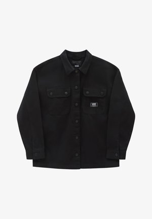 Black button-up shirt made of cotton with two chest pockets, snap buttons, and a Vans logo patch on the left pocket.