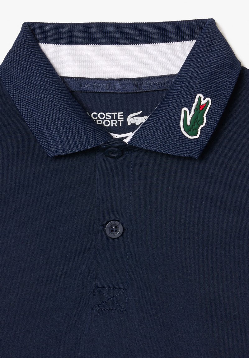 Lacoste Polo bleu marine blanc/bleu ZALANDO