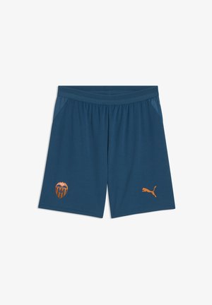 Mørkeblå sportsshorts med elastisk talje, med en orange Valencia CF-logo til venstre og en orange Puma-logo til højre.