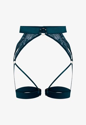 Dark teal strappy lingerie harness with lace panels and gold ring accents, displayed flat on a white background.