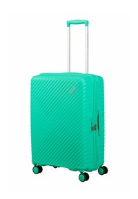 Valise rigide turquoise vif avec des nervures diagonales, quatre roues pivotantes et poignée télescopique déployée.