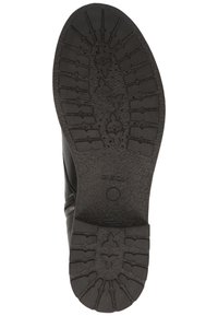Suola di scarpa in gomma nera con motivo di battistrada testurizzato che presenta varie forme e scanalature. Contrassegnata con "GEOX" e "Made in Italy."