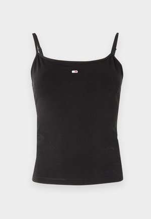 Top camisole nero aderente con sottili spalline regolabili e piccolo logo rettangolare rosso, bianco e blu al centro davanti.