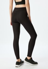 Koton HIGH RISE - Legging (type pantalon) - black