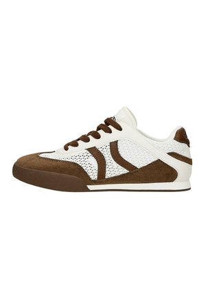 Low-top sneaker with white mesh and brown suede panels, brown laces, and a flat brown sole, shown from the outer side.