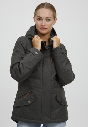 Dark gray, waterproof jacket with a hood, featuring side pockets, button details, and a textured fabric. Designed for warmth and functionality.