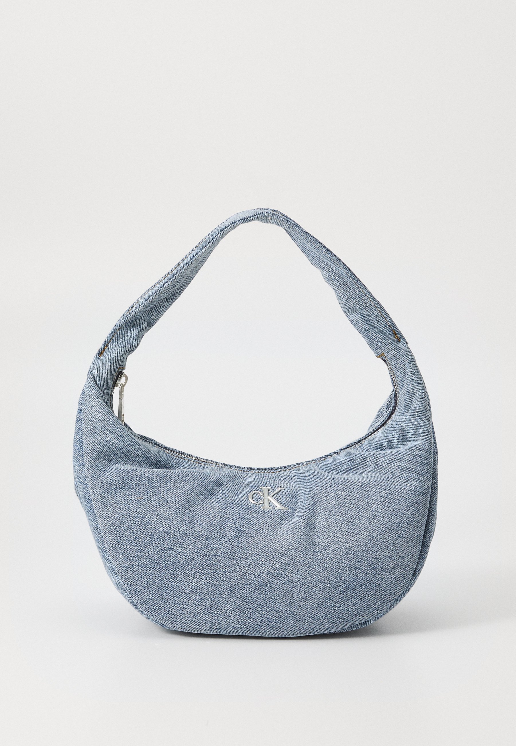 Calvin Klein Jeans SOFT CRESCENT - Handbag - denim/light