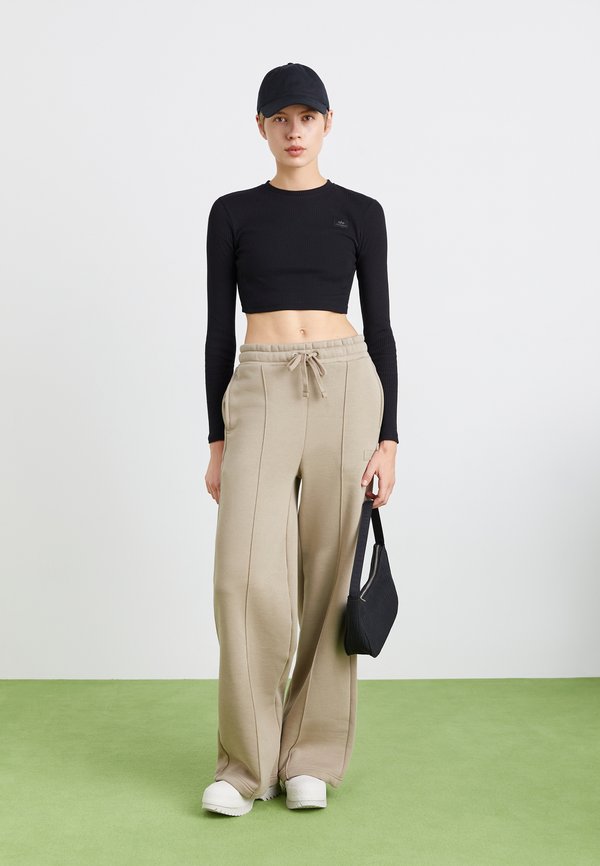 X FIT LABEL WIDE JOGGER - Tracksuit bottoms - vintage sand3