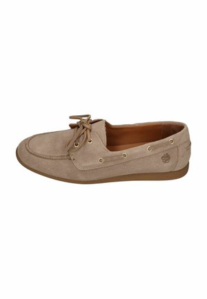 Beige suede moccasin shoe with lace-up detail, stitching accents, and a light brown sole viewed from the side.
