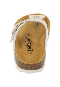 Sandalo bianco con una soffice soletta simile alla pelle scamosciata, intersuola in sughero e una cinghia regolabile con accessori metallici. Suola testurizzata per una migliore aderenza.