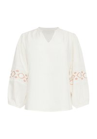 Weißes Blusenshirt mit V-Ausschnitt und langen, puffigen Ärmeln. Verziert mit aufwendiger Korallenstickerei entlang der Ärmelabschlüsse. Weicher, strukturiert Stoff.