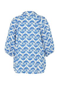 Blusa corta a maniche corte blu e bianca, con un motivo floreale caratterizzato da forme arrotondate, tessuto morbido e vestibilità rilassata. Mostrata vista posteriore.