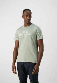 Peak Performance ORIGINAL TEE - Triko s potiskem - limit green