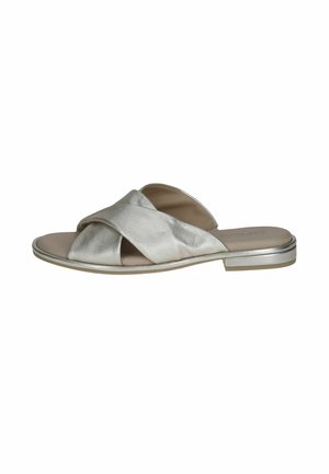 Metallic sølv glidesandal med krydsrem-design, flad hæl og glat tekstur. Har en lysfarvet indersål og diskret metallisk kant.