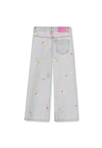 Jeans in denim grigio a gamba larga con ricamo multicolore a forma di cuore, cuciture rosa e un'etichetta di marca rosa sulla vita.