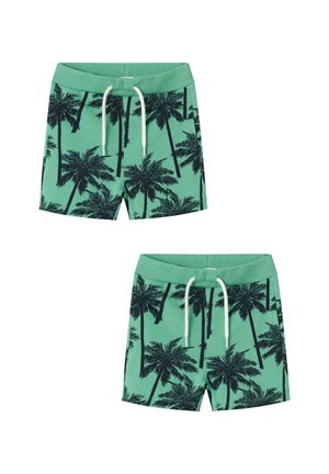 Grüne Badeshorts aus Stoff mit einem Muster aus dunkelgrünen Palmen, mit einem Kordelzugbund und strukturierter Oberfläche.