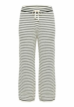 Sort-hvide, vandret striped strikkede bukser med snor i taljen og vide ben.