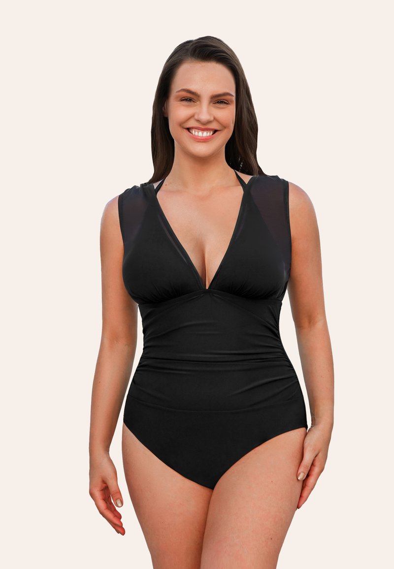 Maillot de bain noir avec un décolleté en V profond, des manches courtes transparentes et un détail froncé à la taille. Fabriqué à partir d'un tissu lisse et extensible pour un confort optimal.