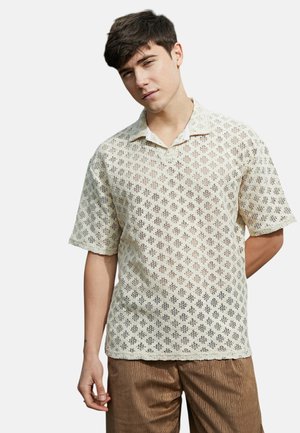 - Koszulka polo