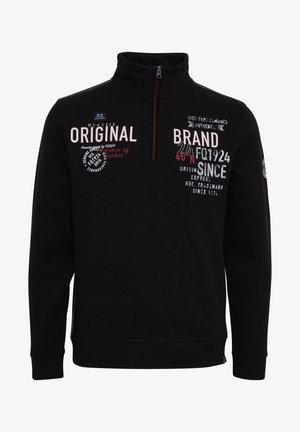 Mustat vetoketjulliset hupparit, joissa on korkea kaulus. Ominaisuuksiin kuuluu valkoisia ja punaisia painettuja tekstejä ja logoja, pehmeä pinta sekä ribbireunukset hihoissa ja helmassa.