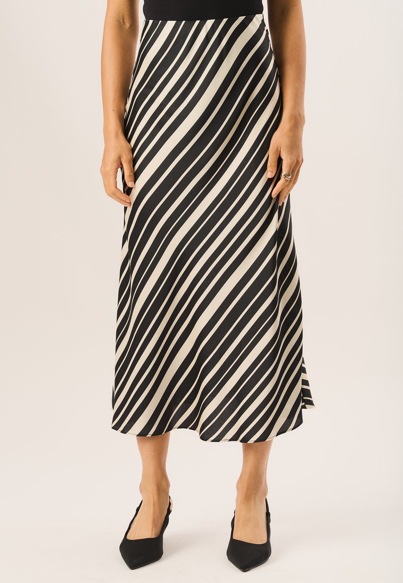 Black and off-white striped midi skirt with a lightweight, flowing fabric. Features a smooth texture and flared hemline.