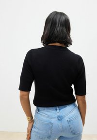 Next REGULAR FIT - BUTTON UP CREW NECK SHORT SLEEVE  - T-shirt - bas - black