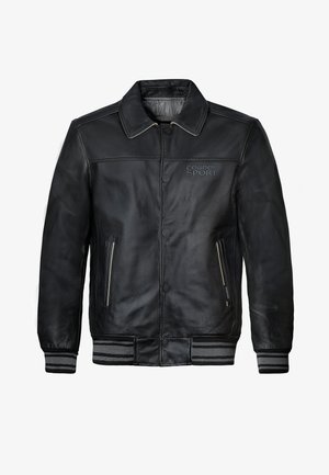 Schwarze Leder-Bomberjacke mit Knopfverschluss, seitlichen Reißverschlusstaschen, gestreiften, gerippten Bündchen und Saum sowie "CORDON SPORT"-Logo auf der Brust.