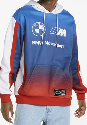Bluza z kapturem w kolorach niebieskim, czerwonym i białym. Posiada gradient kolorów, przednią kieszeń typu kangurka oraz logo BMW Motorsport na piersi.