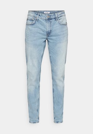 Light blue denim jeans with a straight fit, five pockets, and a slightly faded finish. Features a classic zipper fly and belt loops.