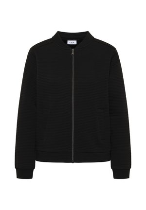 Černá bunda s žebrovanou texturou, předním zipem a bočními kapsami. Má kulatý výstřih a elastické manžety, vyrobená z měkké látky.