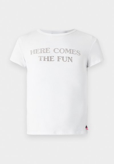 White short-sleeve t-shirt featuring rhinestone text "HERE COMES THE FUN" across the chest. Soft cotton fabric with a classic fit.