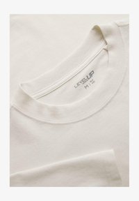 Sélectionné, off white