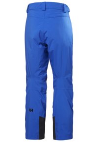 Modré sněhové kalhoty vyrobené z voděodolného materiálu, se střih světlý, dvěma bočními kapsami a černými akcenty na manžetách.