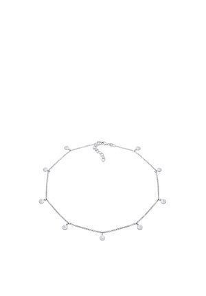 Chaîne de cheville en argent avec sept petits charms ronds uniformément espacés et une fermeture ajustable à fermoir mousqueton.