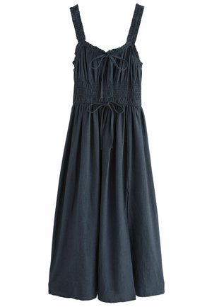Navy-blaues Maxikleid mit gerafftem Oberteil, verstellbaren Trägern und einem fließenden Rock. Hergestellt aus einem weichen Stoff mit strukturierter Oberfläche.